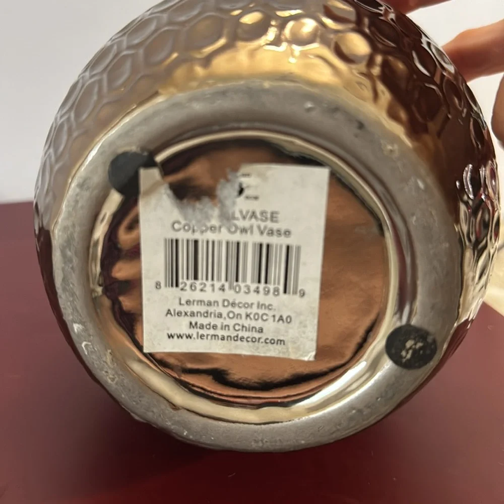 Copper/Bronze colored ceramic owl vase with a dimpled, metallic finish